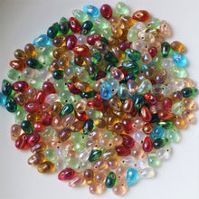 Load image into Gallery viewer, Glass, Droplet, India, Indian, Drops, Baubles, Varanasi, Silver Foil, Jewellery, Bracelet, Necklace, Earrings, Bead Curtain, Suncatcher, 10mm, Pink, Purple, Lime Green, Pink, Pale Blue, Topaz,