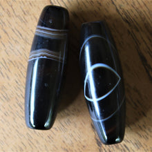 Load image into Gallery viewer, Agate, Botswana, South Africa, Black, Black Agate, Banded-Agate, Semi-Precious, Jewellery-Making, Jewellery, Healing, Collection, Mix, Tigertail, Craftline, Necklace, Bracelet, Spiritual,  Healing Qualities, Polished, Boho, Boho-Style, Beads, Bead Thread, Oval, Half Shield, Boho, Prayer, Cylinder,