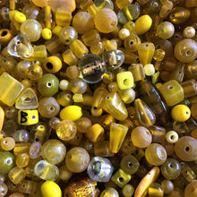 Load image into Gallery viewer, Yellow, Mustard, Lemon, Dijon, Pineapple, Maize, Saffron, Chartreuse, Gold, Citrine, Jasmine, Sun, Jonquil, Canary, Dandelion, Corn, Blonde, Sunflower, Glass, White Metal, Worldwide, Bone, Shell, Tubes, Rounds, Cubes, Bicones, Hearts, Ovals, Drops, Frosted, India, China, Indonesia, Cylinder, Silver Foil, Jewellery, Earrings, Necklaces, Bracelets, Opaque, Transparent, Twists, Frosted,