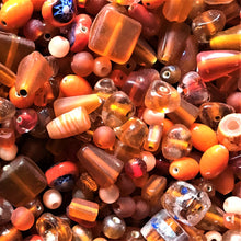 Load image into Gallery viewer, Tangerine, Orange, Squash, Carrot, Yam, Marmalade, Gold, Topaz, Bronze, Tawny, Amber, Persimmon, Peach, Apricot, Marigold, Sunglow, Squash,  Glass, White Metal, Worldwide, Bone, Shell, Tubes, Rounds, Cubes, Bicones, Hearts, Ovals, Drops, Frosted, India, China, Indonesia, Cylinder, Silver Foil, Jewellery, Earrings, Necklaces, Bracelets, Opaque, Transparent, Twists, Frosted,