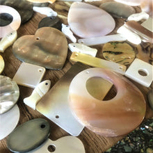 Load image into Gallery viewer, Shells, Mother of Pearl, MOP, Black, Pink, Brown, White, Pink, Red, Green, Yellow, Aqua, Beige, Green, Pucca, Cowries, Branch Coral, Trochus, Abalone Shell, Mussel Shell, Cockle Shell, Nasa Shells, Beach Shells, Hand Carved, Cat Shape, Fish Shape, Bird Shape, Blister Pearl, Fish Bone Vertebrae, Clam Shells, Dyed, Slabs, Jewellery, Necklaces, Bracelets, Earrings, Freshwater Pearls, Snail Shell, Sliced Cowries, Buttons, Pau Shell, Pendants, Jewellery, Necklaces, Bracelets, Earrings, Suncatchers,