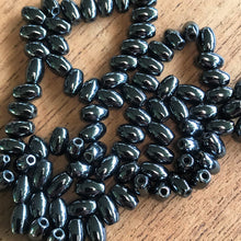 Load image into Gallery viewer, Haematite, Magnetic, Assorted, Mix, Semi-Precious, Stone, Beads, Anisotropic, Western Australia, Venezuela, North America, Lake Superior, Brazil, Eastern Canada, Black, Steel, Mineral, Jewellery-Making, Health, Ailment, Earrings, Necklace, Bracelet, Iron Ore, Bicones, Rounds, Collections, Arrows, Rice, Ovals, Drops, Bows, Protection, Black, Global Beads, Hole, Centre-Drill,