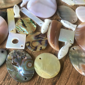 Shells, Mother of Pearl, MOP, Black, Pink, Brown, White, Pink, Red, Green, Yellow, Aqua, Beige, Green, Pucca, Cowries, Branch Coral, Trochus, Abalone Shell, Mussel Shell, Cockle Shell, Nasa Shells, Beach Shells, Hand Carved, Cat Shape, Fish Shape, Bird Shape, Blister Pearl, Fish Bone Vertebrae, Clam Shells, Dyed, Slabs, Jewellery, Necklaces, Bracelets, Earrings, Freshwater Pearls, Snail Shell, Sliced Cowries, Buttons, Pau Shell, Pendants, Jewellery, Necklaces, Bracelets, Earrings, Suncatchers,